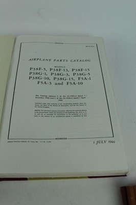 Lot 811 - Interesting group of reproduced and bound Second World War parts catalogues and manuals and operational flight instructions for P-38H, P-38J, P-38L and F-5B, (5 items)