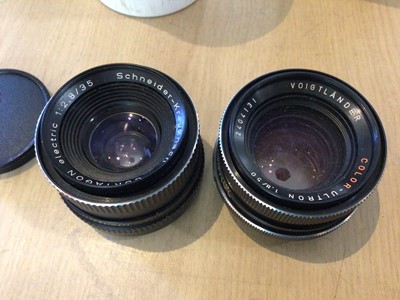 Lot 2356 - Large quantity of camera lenses and other equipment, including Dallmeyer, Voigtlander and many others (4 boxes)