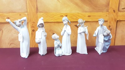 Lot 1241 - Five Lladro porcelain figures of children, four boxed