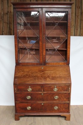 Lot 1440 - George III mahogany bureau bookcase