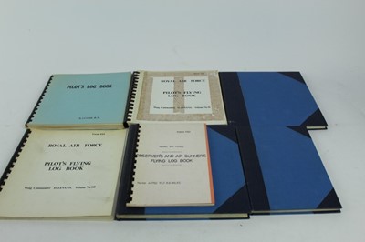 Lot 821 - Seven reproduced Second World War pilots log books, named to 48750 F/LT. R.E. Wilks, Wing Commander D.J. Evans and R.J Cork