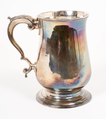 Lot 409 - George III silver baluster tankard