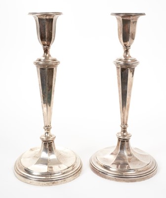 Lot 413 - Pair of early George V baluster candlesticks, one damaged