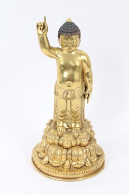 Lot 789 - Oriental gilt bronze figure of buddha on a double lotus base