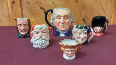 Lot 1256 - Collection of nineteen small Royal Doulton character jugs to include The Sleuth, The Guardsman and Catherine Howard, together with five other character jugs (24)