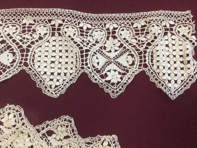 Lot 2088 - Box of lace including bobbin lace large fall cap, Maltese lace lengths and other items, bobbin lace wide collar and lenght, decorated net lace plus some lace table linens.