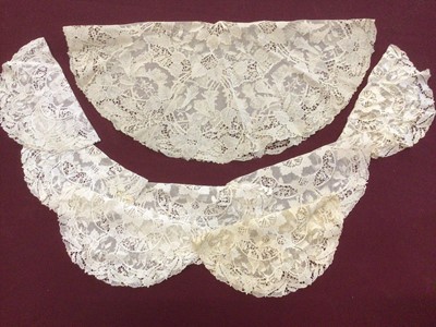 Lot 2088 - Box of lace including bobbin lace large fall cap, Maltese lace lengths and other items, bobbin lace wide collar and lenght, decorated net lace plus some lace table linens.