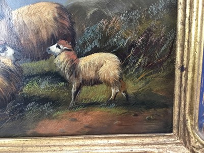Lot 32 - Manner of John W. Morris oil on board - sheep in a mountainous river landscape, 24cm x 30cm