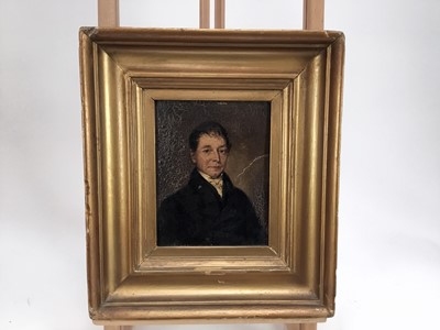 Lot 57 - English School early 19th Century oil on board - A half length portrait of a gentleman, 16cm x 13cm, in period gilt frame