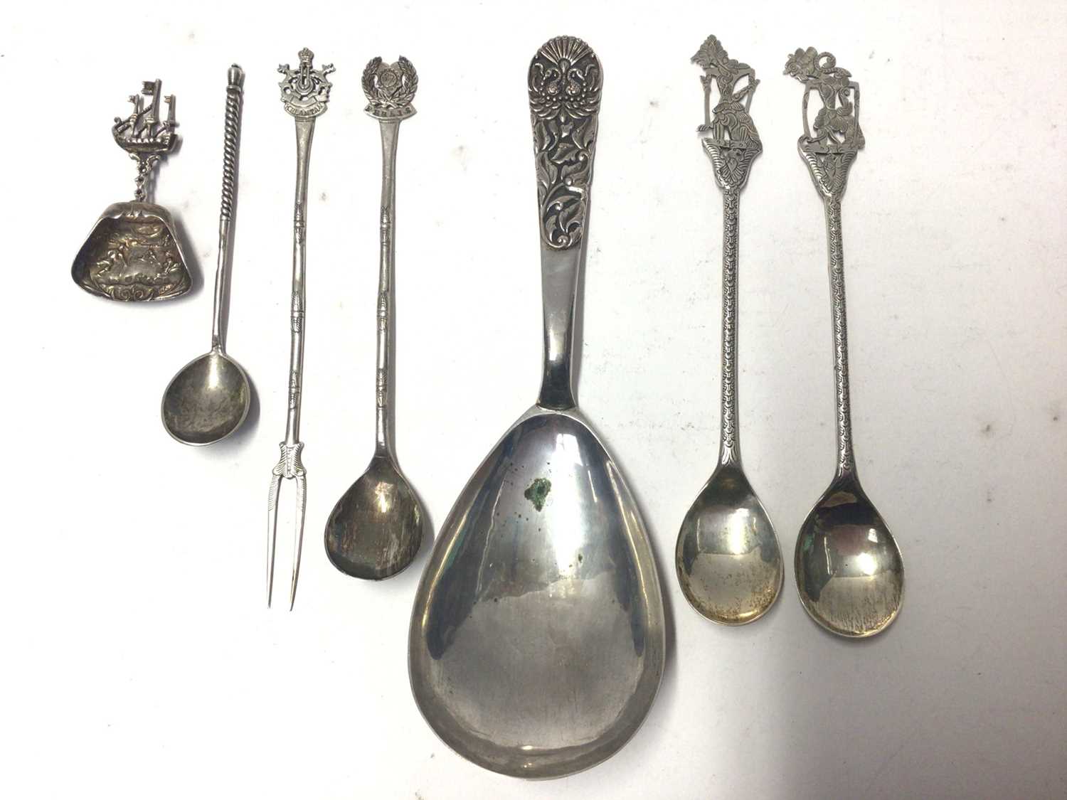 Lot 218 - Collection of silver and white metal items to include Russian silver spoon, Dutch silver caddy spoon and others, all at 8.5oz