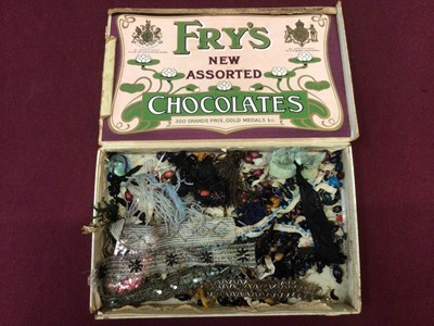 Lot 2089 - 1920's and 1930's dress beaded fringing, insets and embellishments loose and in chocolate boxes, good quantity.