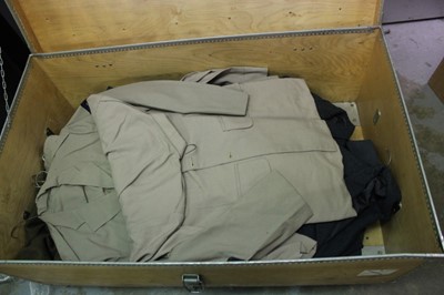 Lot 852 - Large collection of assorted military uniform to include an RAF Great Coat, in a chest on wheels, together with another chest of uniform.