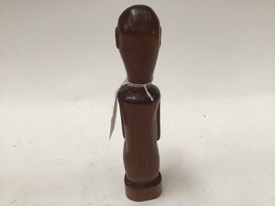 Lot 2635 - African red ivory wood figure of a seated monkey, in the style of the Baboon Master of Southern Africa, 21cm high