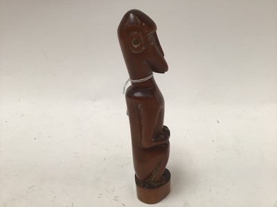 Lot 2635 - African red ivory wood figure of a seated monkey, in the style of the Baboon Master of Southern Africa, 21cm high