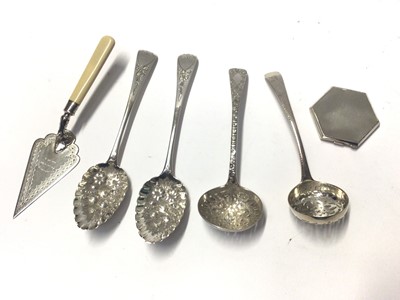 Lot 222 - Two Georgian Old English pattern table spoons, converted into berry spoons, together with other flatware, a silver compact and a silver plated presentation trowel with ivorine handle, various dates...