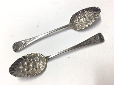 Lot 222 - Two Georgian Old English pattern table spoons, converted into berry spoons, together with other flatware, a silver compact and a silver plated presentation trowel with ivorine handle, various dates...