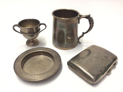 Lot 225 - George V silver christening mug, (Chester 1910), together with a silver cigarette case, pin dish and trophy cup, (various dates and makers), all at 6.5oz