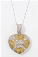 Lot 789 - White and yellow metal diamond heart-shape...