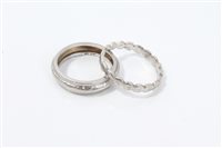 Lot 790 - Two platinum wedding rings. Sizes J and L½