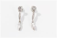 Lot 793 - Pair diamond pendant earrings, each with a...