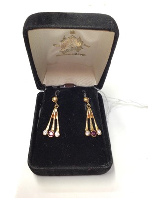 Lot 265 - Pair of ruby and diamond earrings