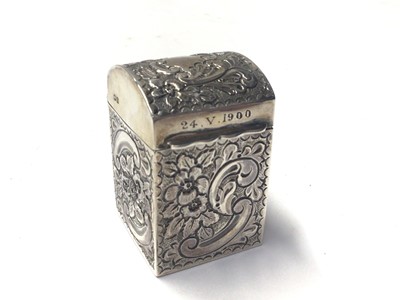 Lot 242 - Late Victorian silver box with embossed decoration, domed hinged lid and interior containing miniature playing cards, (Chester 1899), 5.5cm in height.