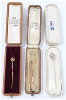 Lot 797 - Art Deco American diamond stick pin and a gold...