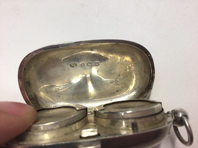 Lot 251 - George V silver double sovereign case of oval form, (Birmingham 1912), maker M. Emanuel, 6.5cm in length