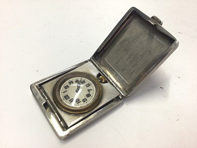 Lot 253 - George V Art Deco silver travelling time piece, mounted in a folding easel stand case with engine turned decoration, (Birmingham 1932), maker A. Cox, 5cm in length