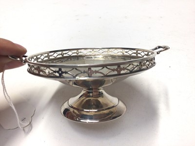 Lot 255 - Pair of George V silver twin handled bonbon dishes, (Birmingham 1925), maker Docker & Burn Ltd, each 13.6cm in diameter, all at 5.6oz