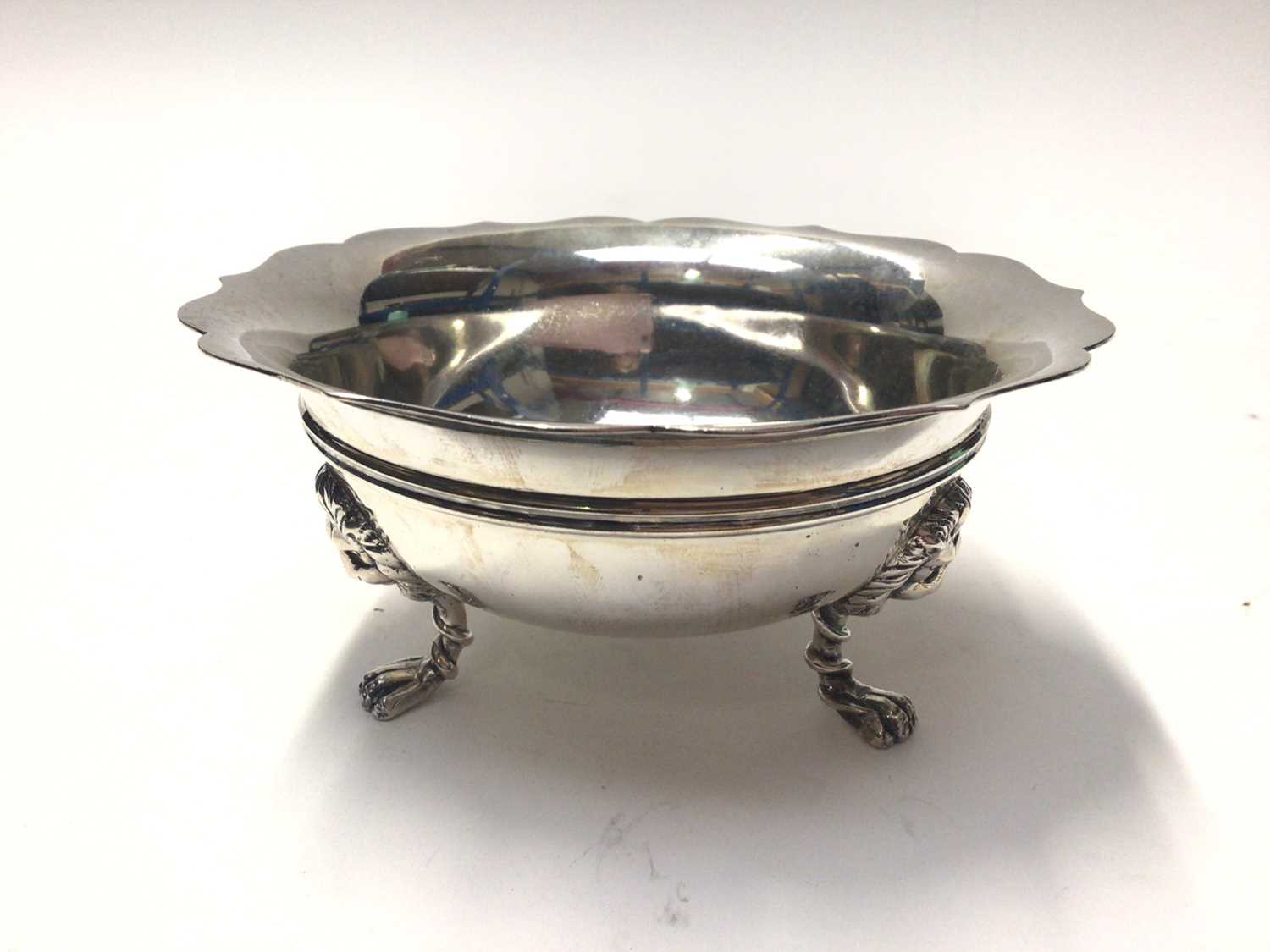 Lot 256 - Edwardian silver sugar bowl, raised on three feet, (London 1903), maker Frederick William Hentsch, 13.5cm in diameter, all at 8.2oz