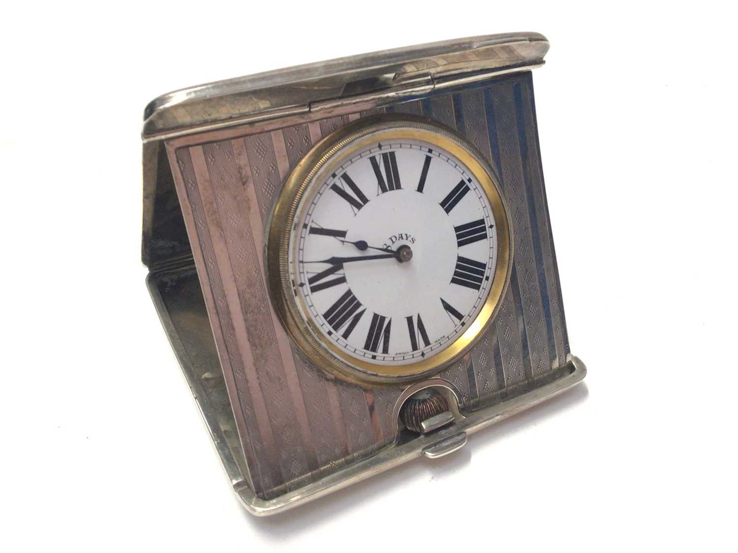 Lot 259 - George V silver cased travelling desk clock, with Swiss 8 day movement, (Birmingham 1917), maker Synyer and Beddoes, 10 x 10cm
