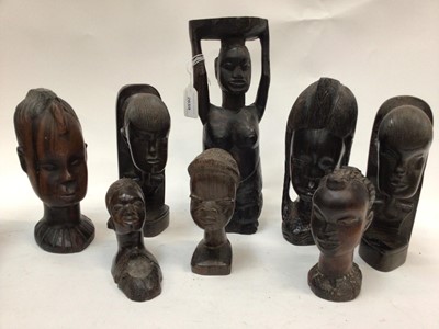 Lot 2659 - Group of carved African figures, masks, headrest, etc