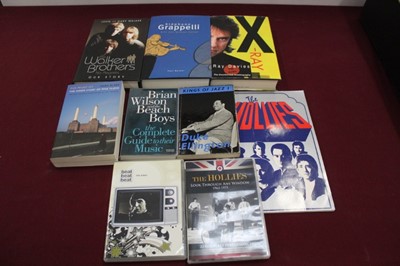 Lot 803 - Four boxes of assorted music related items including books, DVD's, video's etc - artist's include Jerry Lee Lewis, Hollies, Pink Floyd, Cream, Blind Faith, Yardbirds and Adam Faith