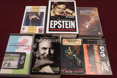 Lot 802 - Three boxes of music related books including Beatles, John Lennon, Eric Clapton etc, also VHS video tapes featuring Led Zeppelin and Eric Clapton