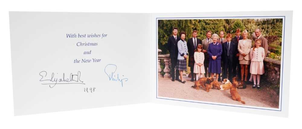 Lot 10 - H.M. Queen Elizabeth II and H.R.H. The Duke of Edinburgh, signed 1998 Christmas card with twin gilt Royal ciphers to cover and colour photogragh of the Royal family to the interior, with envelope