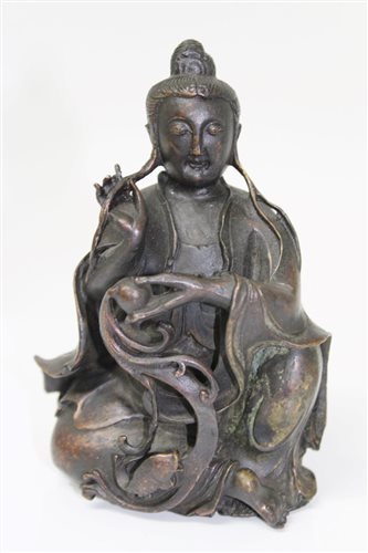 Lot 827 - Antique Chinese bronze figure, the seated...