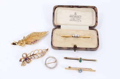 Lot 519 - Six gold and gem-set brooches to include diamond three-stone bar brooch, aquamarine single stone bar brooch, opal brooch, 18ct gold and ruby leaf brooch, 9ct amethyst leaf brooch and a 9ct gold dia...