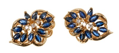 Lot 520 - Pair of 14ct gold sapphire and diamond earrings with marquise cut blue sapphires and brilliant cut diamonds, with clip fittings