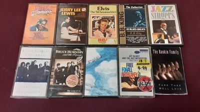 Lot 2250 - Box of music cassettes including Bob Dylan, Eric Clapton, Paul Simon, Dire Straits, Simon & Garfunkel, Genesis, Joni Mitchell, Ry Cooder etc (50)