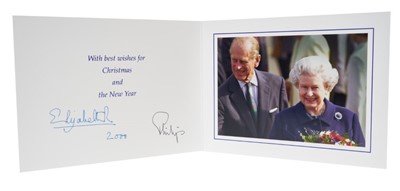 Lot 12 - H.M.Queen Elizabeth II and H.R.H. The Duke of Edinburgh, signed 2000 Christmas card with twin gilt Royal ciphers to cover, colour photograph of the Royal couple to the interior, with envelope