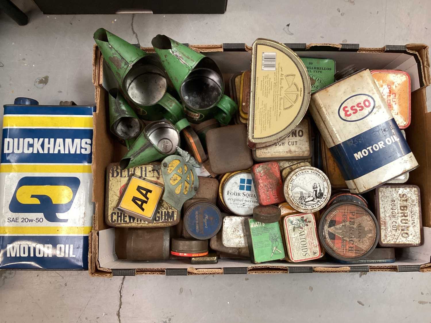 Lot 2031 - Collection of four vintage Castrol oil jugs, together with two AA badges, Duckhams oil can and other vintage tins etc.