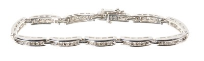 Lot 570 - 18ct white gold diamond bracelet