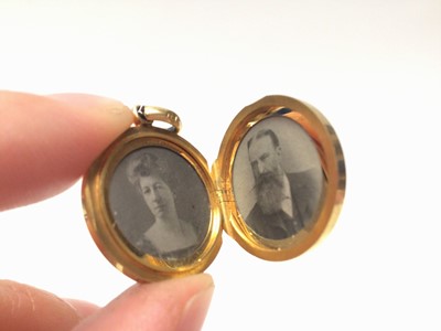 Lot 303 - Edwardian locket engraved 1883-1908 marked 18c and tests 18ct gold