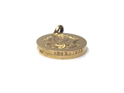 Lot 303 - Edwardian locket engraved 1883-1908 marked 18c and tests 18ct gold
