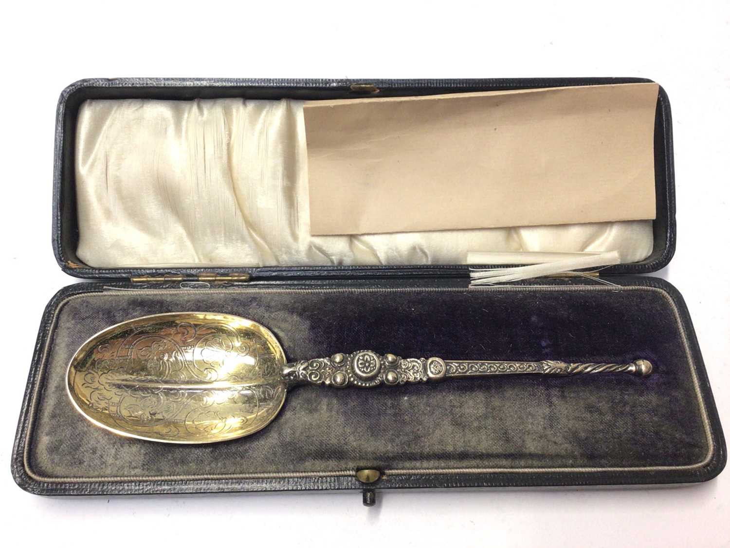 Lot 287 - Naval Interest- George V silver gilt annointing spoon, engraved D.H.J. H.M.S./M L33 29 May 1919, (London 1910), maker Reid & Sons, in fitted case, together with interesting letter of provenance.