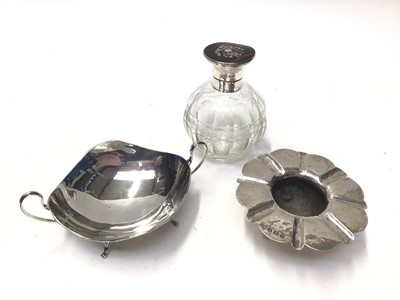 Lot 294 - Edwardian silver dish with planished decoration, (Birmingham 1906), maker George, Nathan and Ridley Hayes, together with a George V silver topped scent bottle (London 1916), a George V silver two h...
