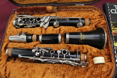 Lot 2252 - Corton clarinet in case, together with a lesson book