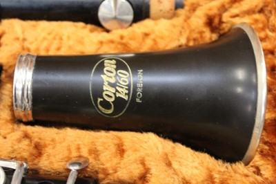 Lot 2252 - Corton clarinet in case, together with a lesson book