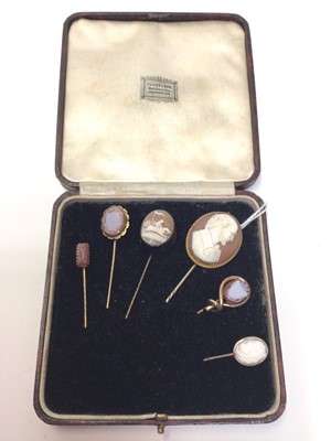 Lot 317 - Group of six Victorian cameo stick pins to include a cameo depicting a jockey on racehorse, three carved hardstone stick pins and two further carved shell cameo stick pins (6)